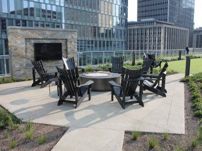 Outdoor Seating Around Fire with a TV